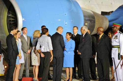 Vice President Biden is greeted by Prime Minister Persad-Bissessar